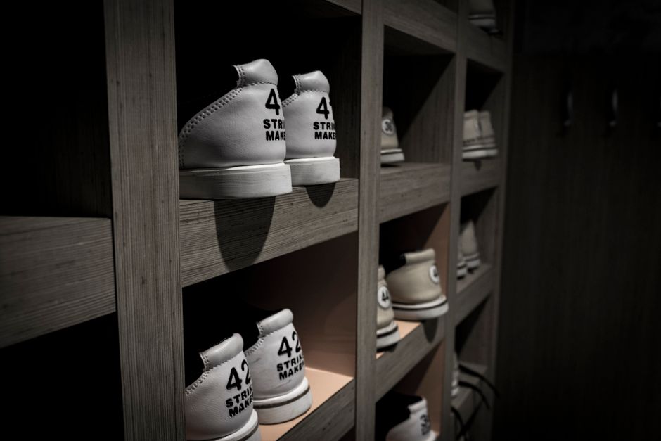 Neatly arranged shoes on a custom closet shelf